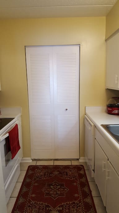 Kitchen with large pantry.