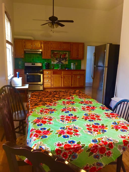 Large dining table connected to the kitchen for lots of group fun