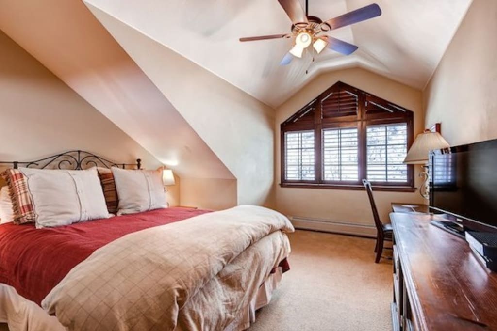 Get a good night's rest in the spacious master bedroom.
