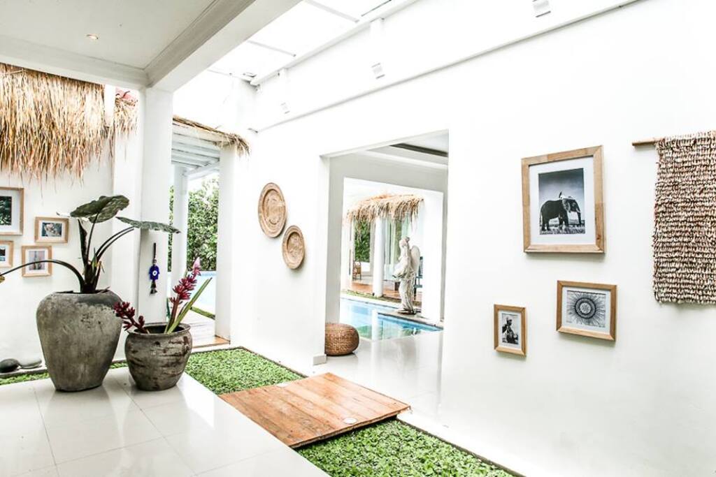 Beautiful art and photography by Jergen Teller and other artists curate the villa