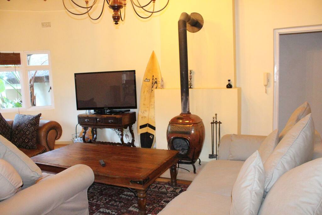 Wood fire place, big screen TV and comfortable couches
