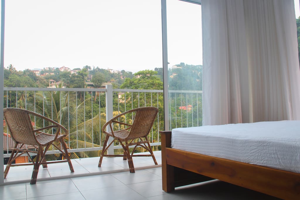 Clean, light & bright inside, with floor-to-ceiling windows & curtains, which also includes attached bathrooms with hot/cold water facilities & balconies with views of trees, flowers, hills and wildlife.