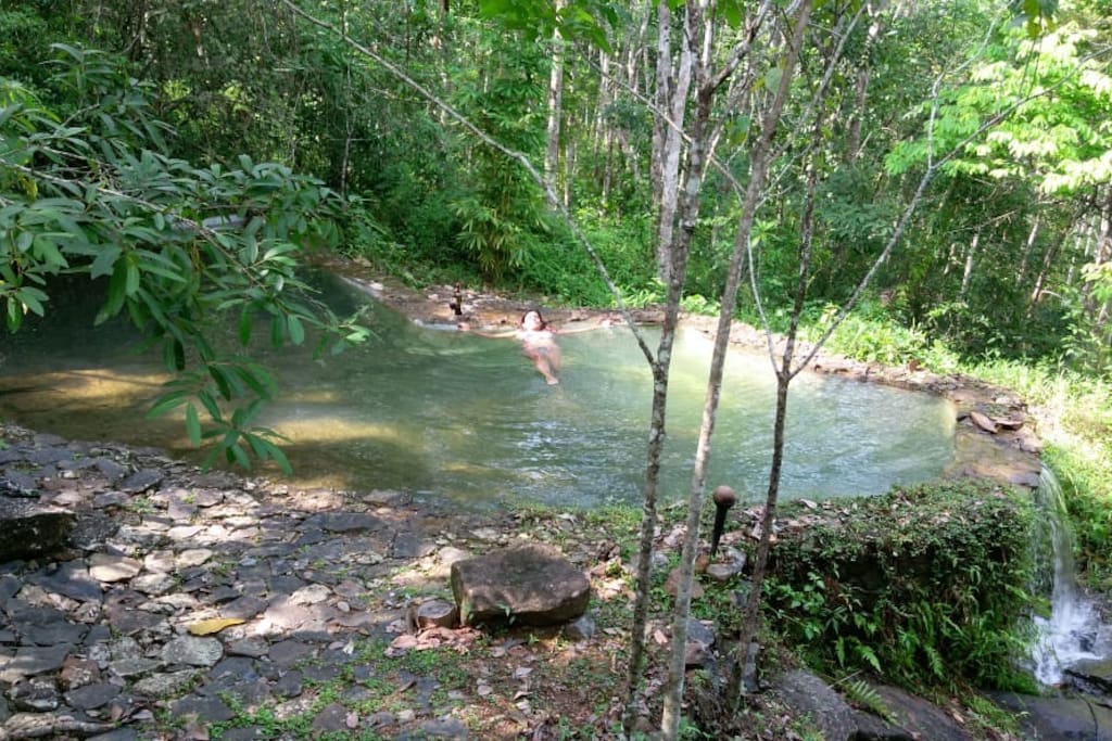 Relaxing in the natural pool