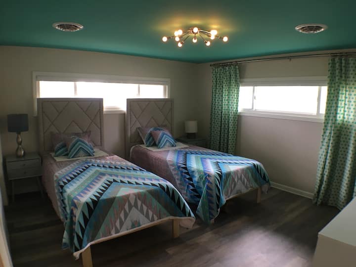 Twin XLs in the second bedroom so that both children or adults will be comfortable.