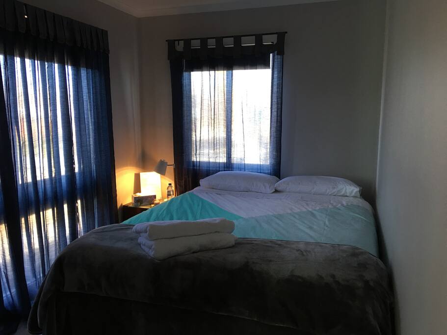 Bedroom with queen size bed.