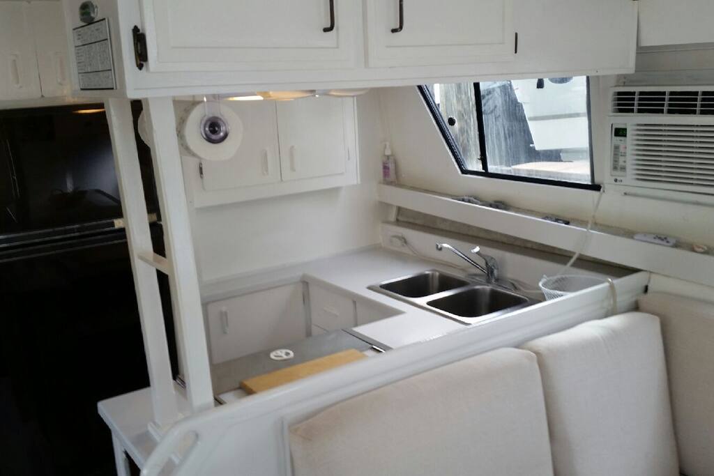 Fridge, freezer and a/c n kitchen area posted here
