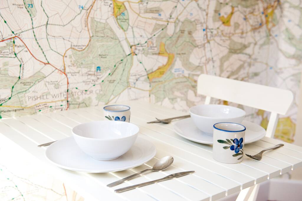 Breakfast showing our lovely wall map of the area - great for planning walks