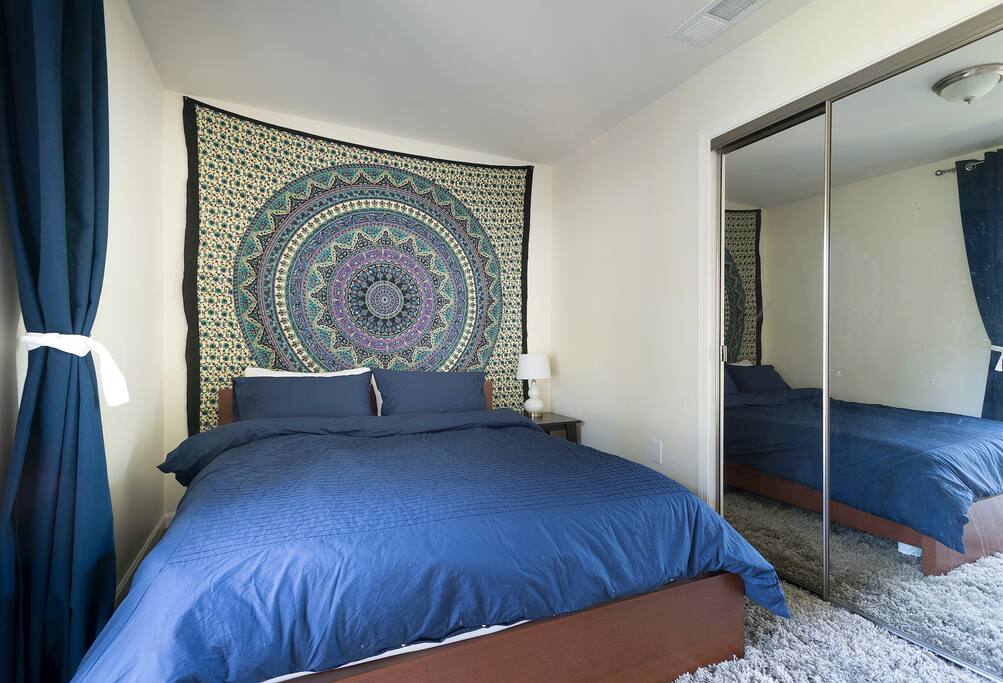 Comfortable bedding and a spacious closet make this room great for a long term stay