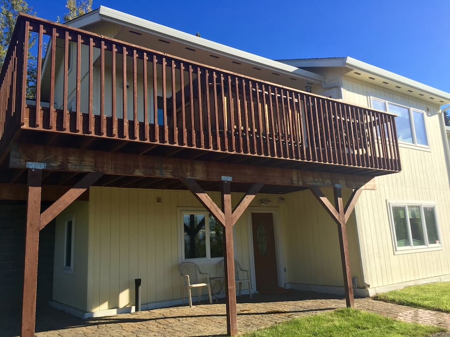 The downstairs apartment unit with wrap around covered porch.