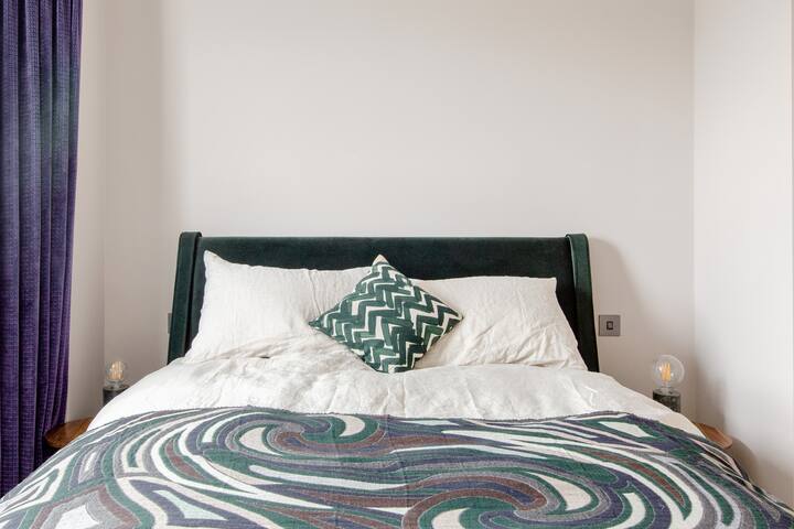 Chill in the Sleek Teal and Marble Kitchen at a Period Pad gallery image 4