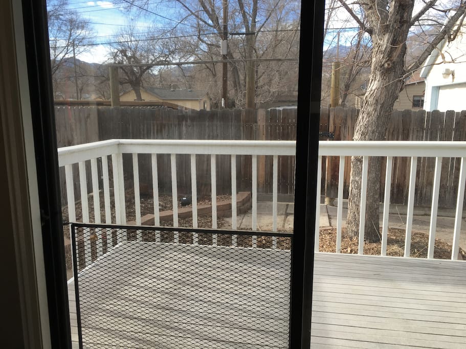 A large deck off the living room. When the weather gets warm, the lawn furniture comes out.