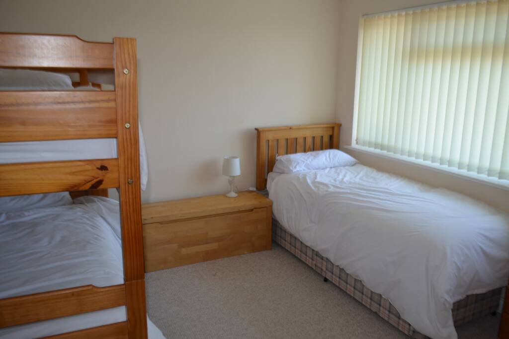 Bunk beds and a single bed