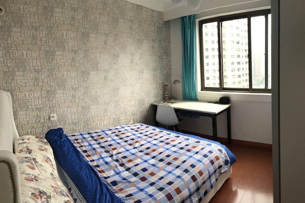 Room with desk and wardrobe