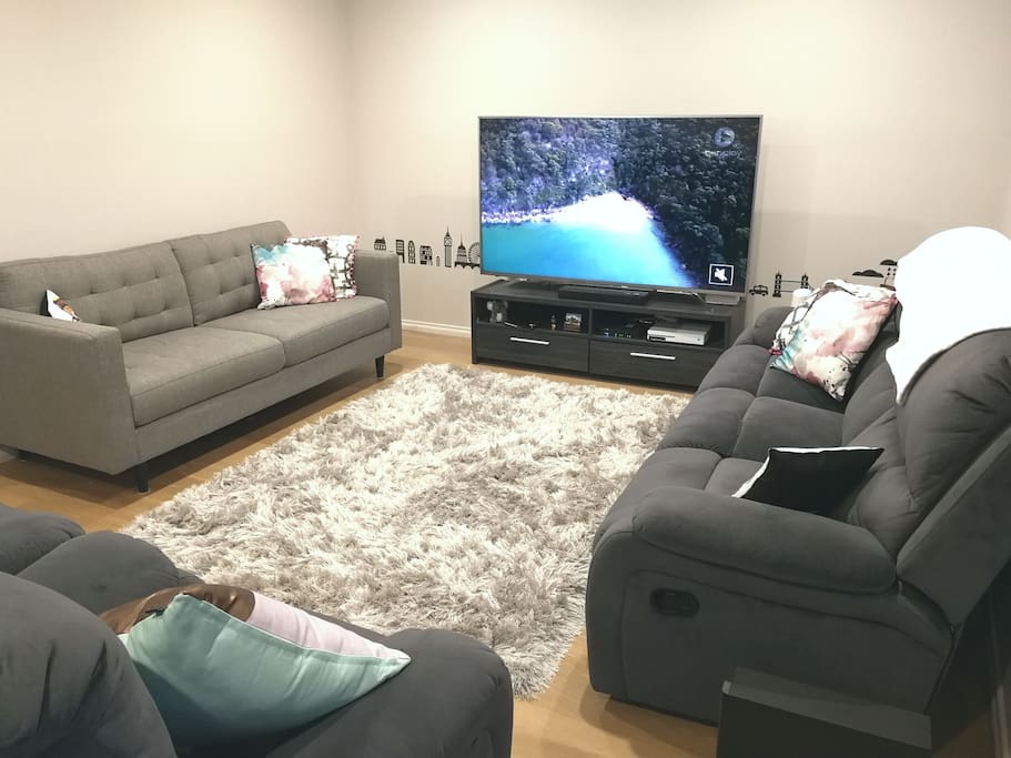 A fully-loaded living area with 70" TV, Home theatre and XBOX