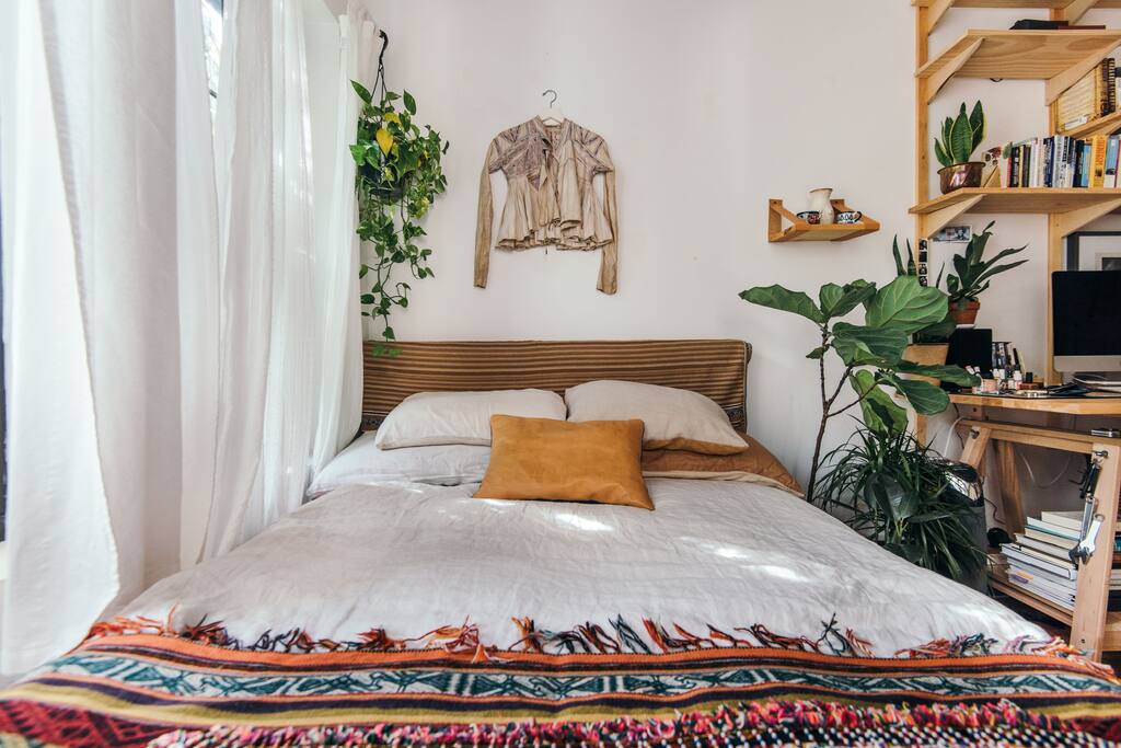 Full bed with memory foam mattress and down comforters.