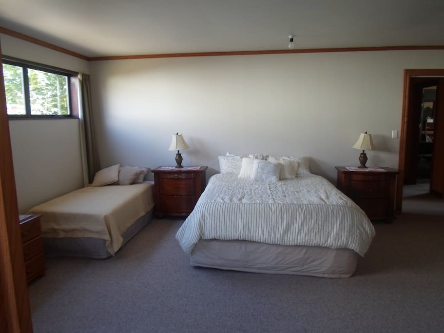 Bedroom 2 contains 1x Queen 1x single.