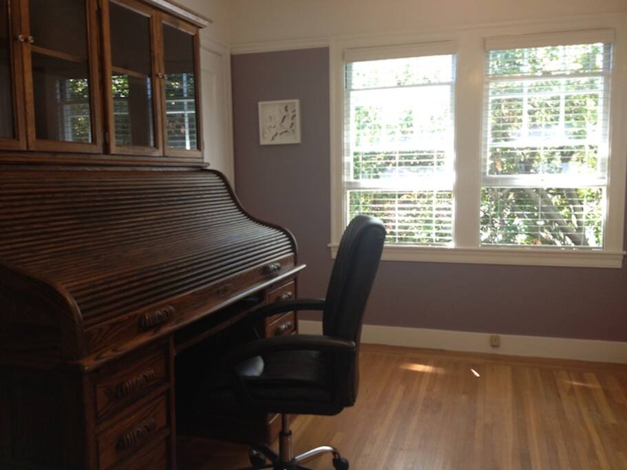 Large Office Adjoins Purple Bedroom