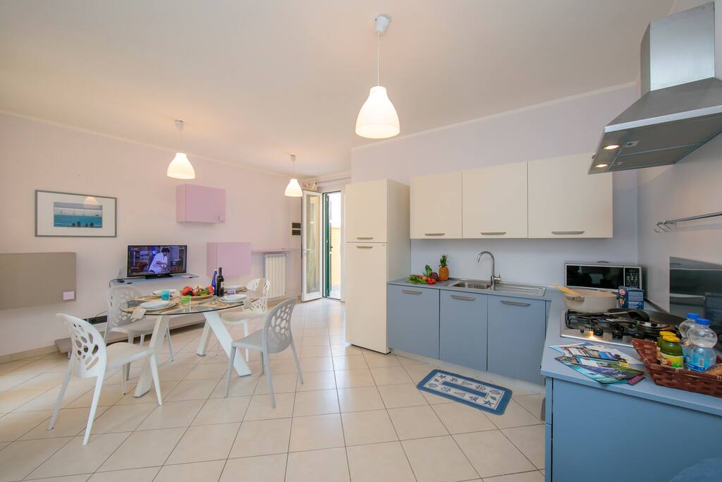 Bright Living room and fully equipped kitchen