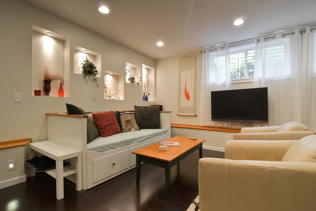 View of open concept living space from fireplace