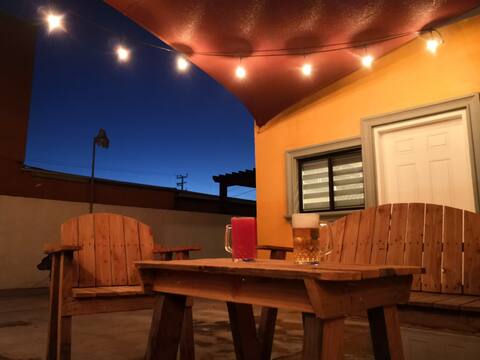 Yellow house with backyard for BBQ