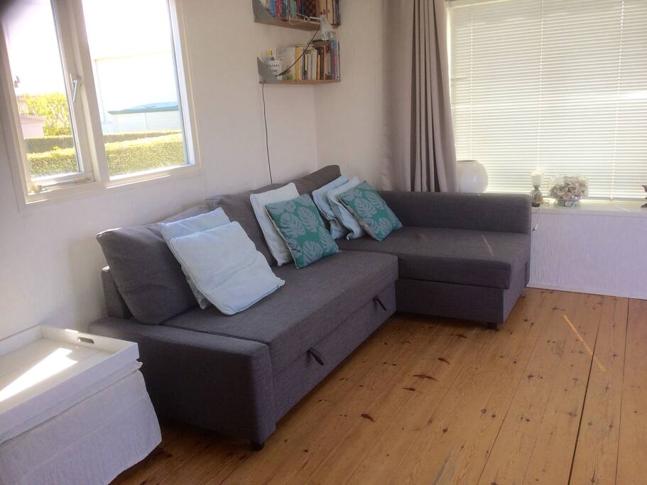 Woonkamer met 2 pers. slaapbank