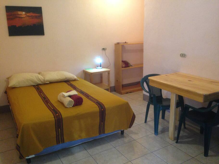 Brand new mattress, table and chairs, shelves, reading lamp.
