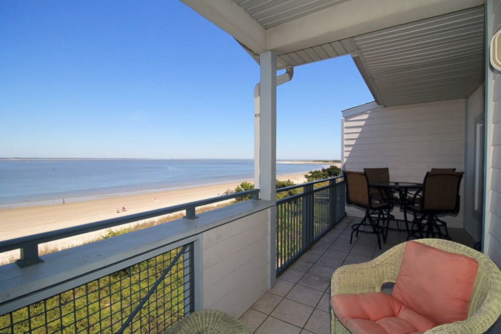 Enjoy Watching the Dolphins Frolicking in the Waters of the Savannah River Entrance and Atlantic Ocean from your Private Balcony