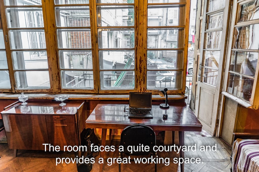The room faces a quite courtyard and provides a great working space.