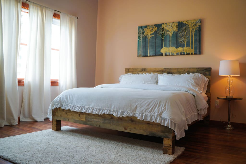 Master bedroom with a king size comfy bed