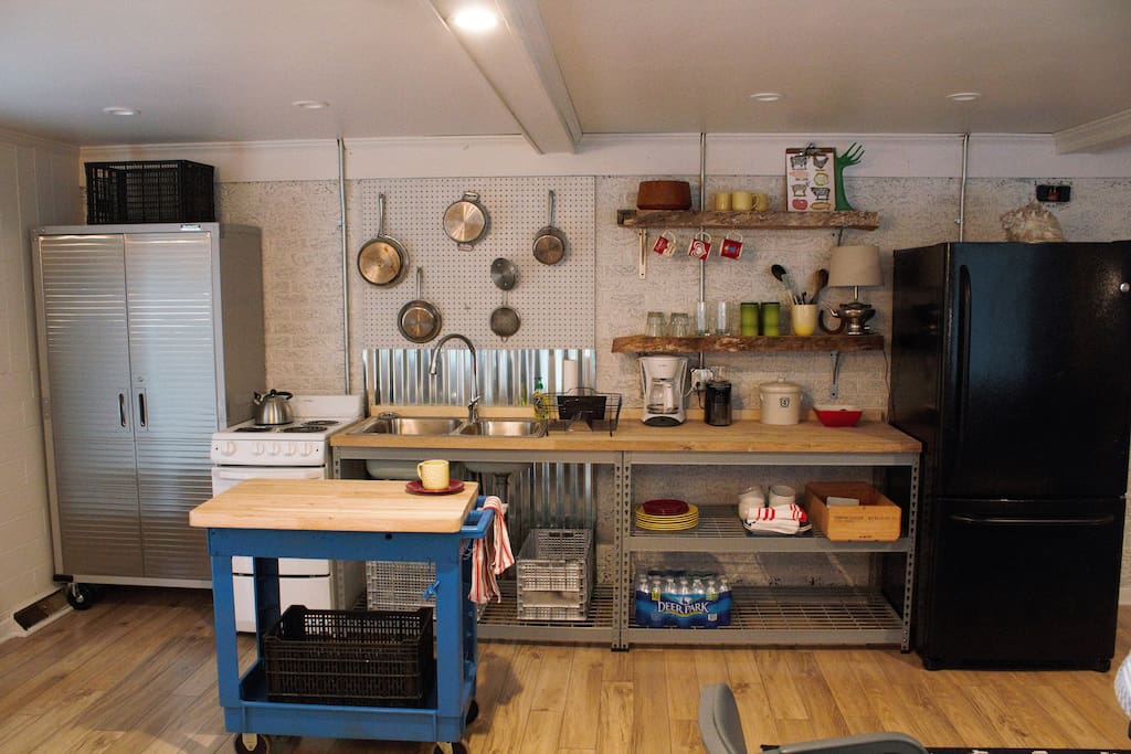 Industrial kitchenette. Oodles of counter space, and charm to boot!