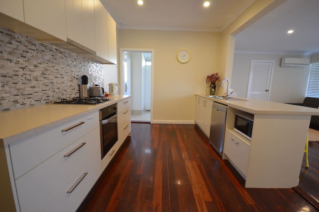 Fully Equipped Kitchen - Stove, Microwave, Rice Cooker, Kettle, Toaster.