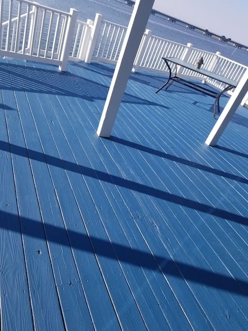 freshly painted deck overlooking the water