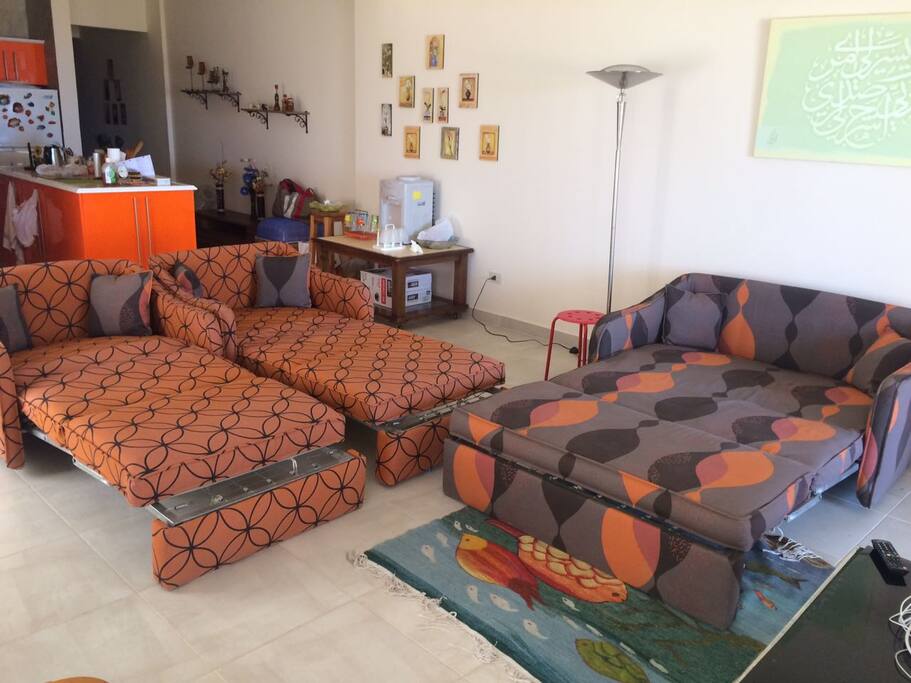 Reception , set turns into sofa beds .