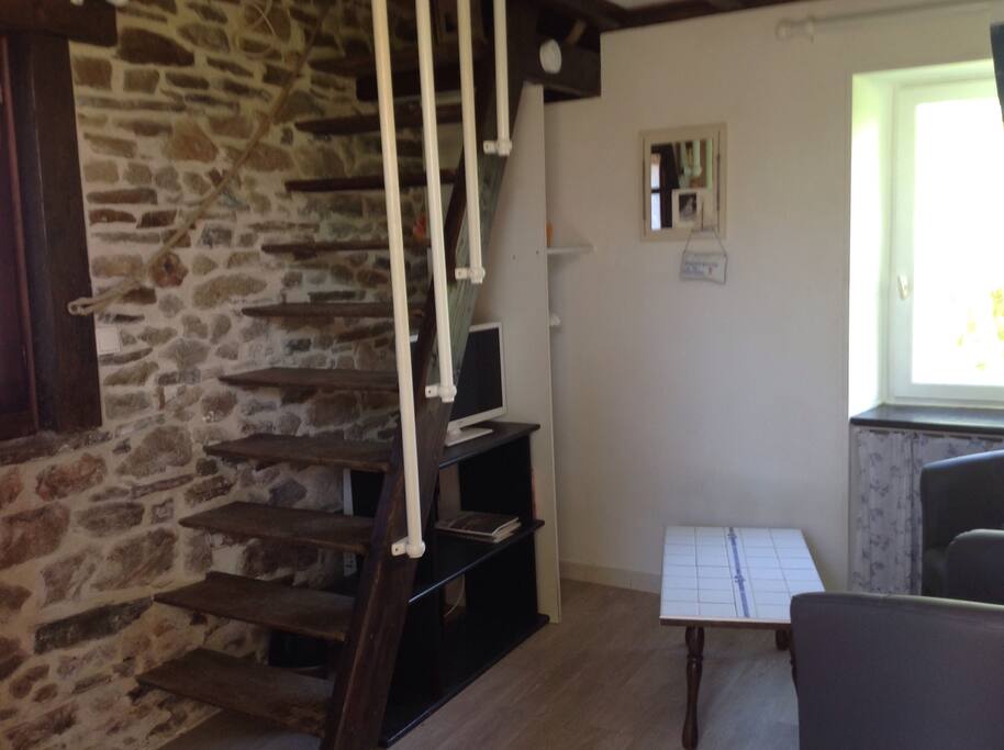 Escalier de meunier pour accès à la mezzanine