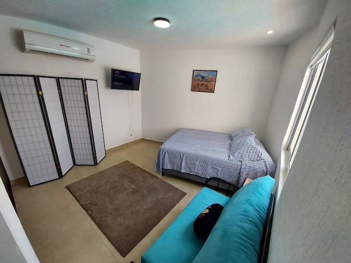 Master bedroom with  smart TV, minibar.

Master bedroom with  smart TV, mini-fridge