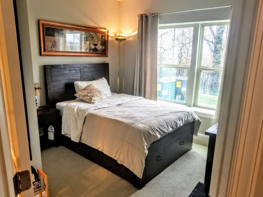 Bedroom.Matching bedroom set with a full size platform storage bed, chest, mirror, and nightstand.