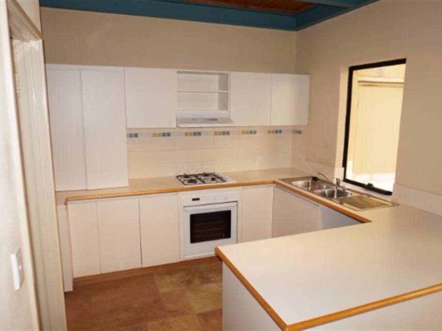 Kitchen of identical mirror-image unit (photos of my kitchen not yet availble)