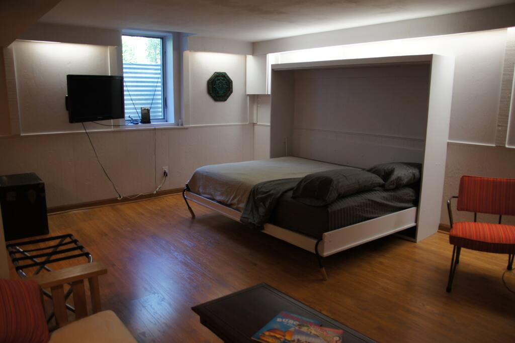 Wall bed open and ready for a sound night sleep