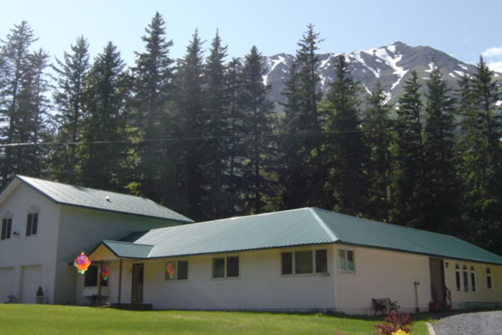 Street view of house, guest suite entrance is on the right end.