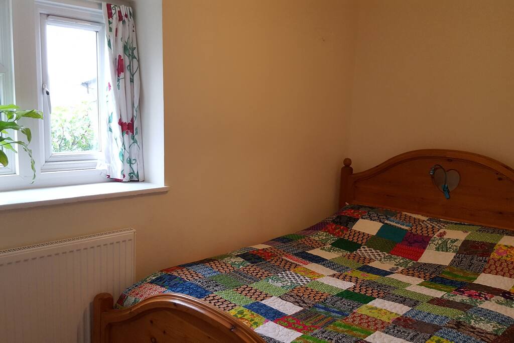 King-sized bed in separate bedroom