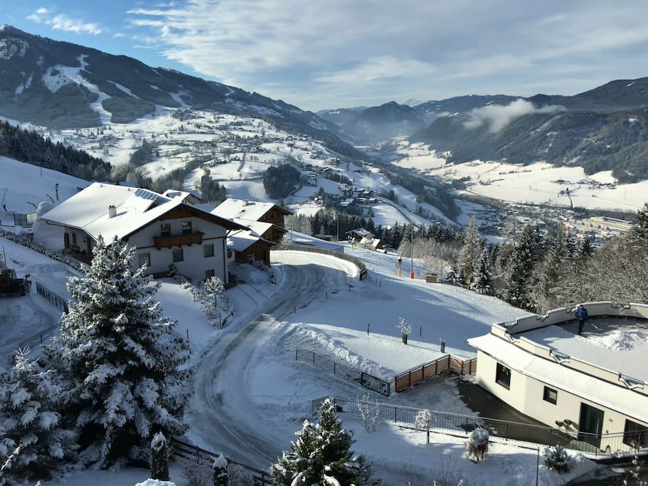 View from living room overlooking piste and Schladming town
