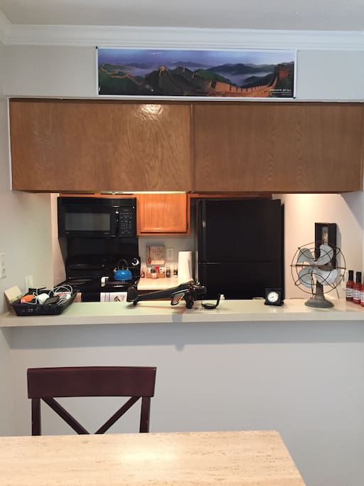 Cozy Kitchen w/ utensils, dishes, pots, pans,etc.