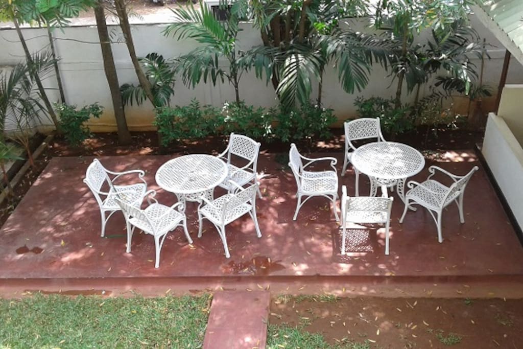 there is a patio with garden furniture for you to relax and watch the world go by