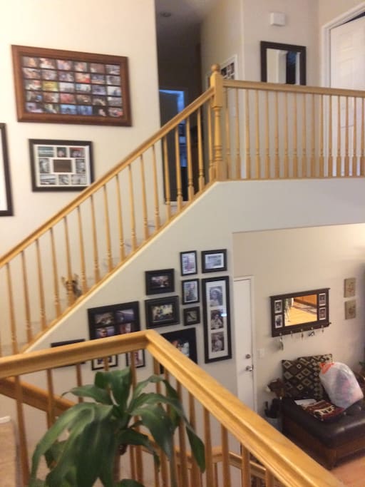 Split level home with wood floors and cathedral ceilings