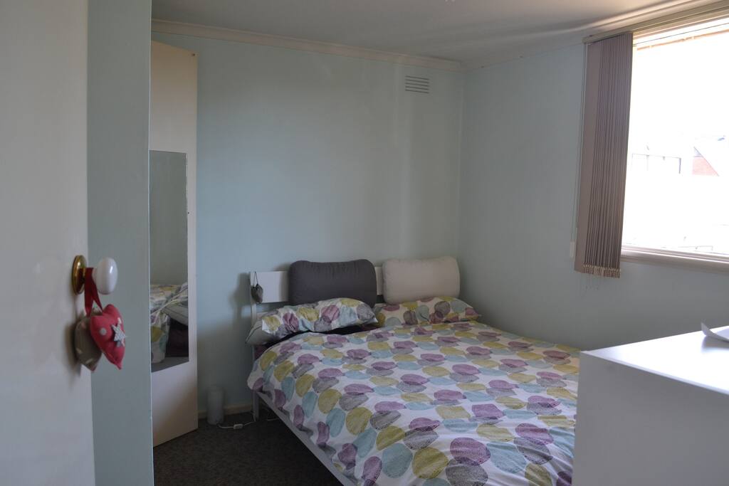 large bedroom with queen size bed