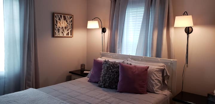 Snuggle into our plush, queen  pillow top bed and when you're ready to close your eyes just touch the lamp to turn the lights off!