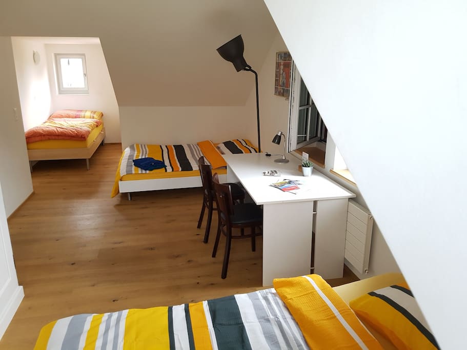Room with 2 bouble beds and one single bed
