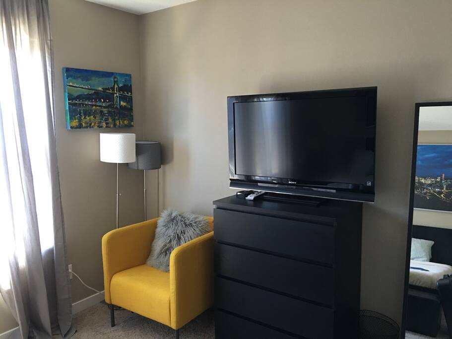Flat screen TV with premium cable and Apple TV