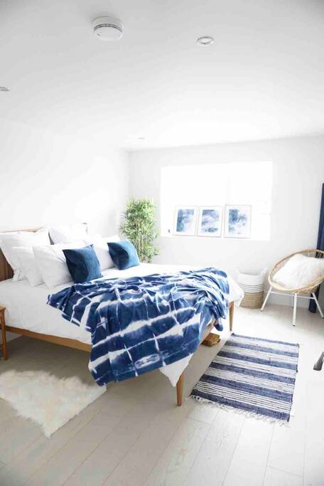 Spacious light airy room with a king size bed just waiting for you to sleep in