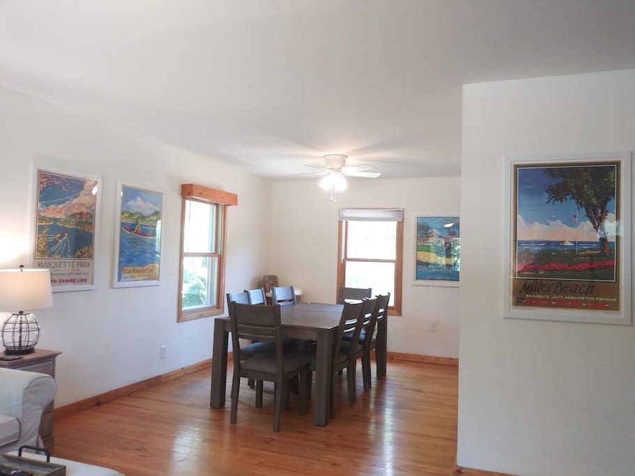 Dining room adjacent and open to living room sofa area
